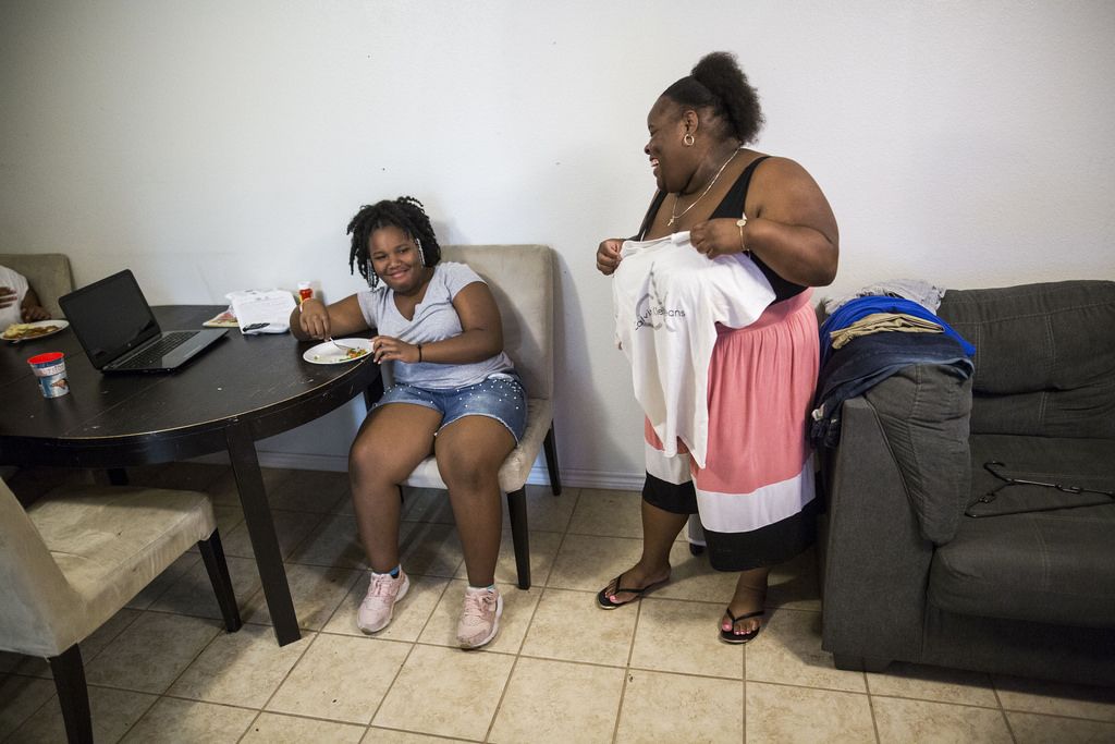 Walker-Powell laughs with her sister, Dez'Ariah Wright.